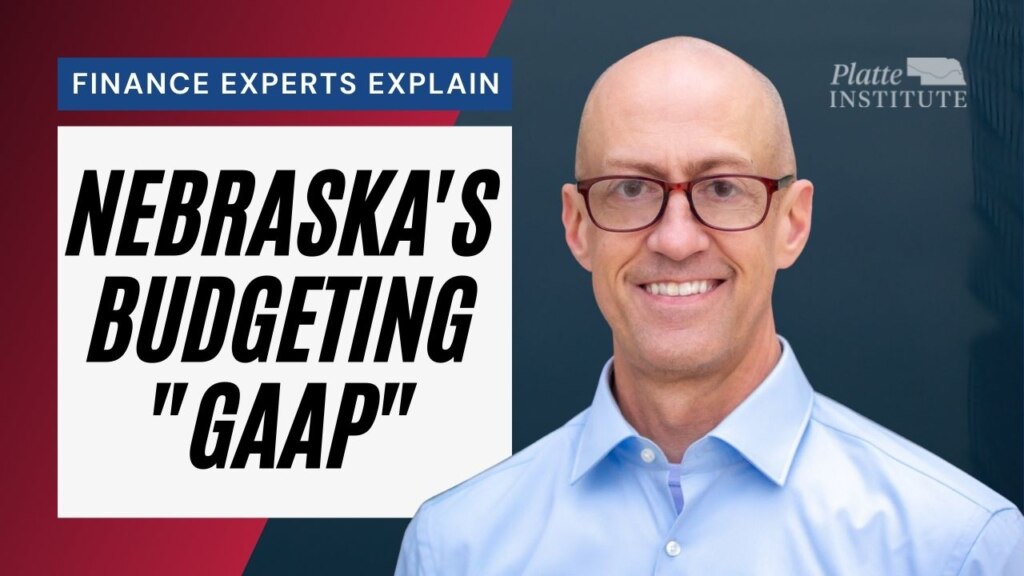 A title card for an episode of the Nebraskanomics Podcast. A photo of Jim Vokal at right includes the text "Finance Experts Explain Nebraska's Budgeting "GAAP." GAAP is a monogram for Generally Accepted Accounting Principles.